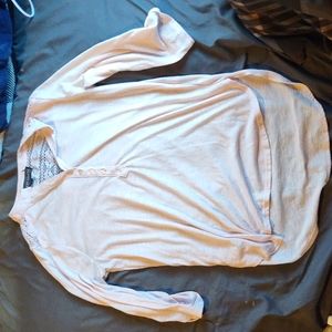 A pink semi-long sleeve shirt